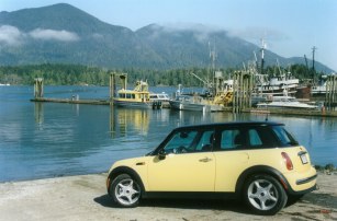 Yellow/black MINI Cooper at wharf in Tofino, BC